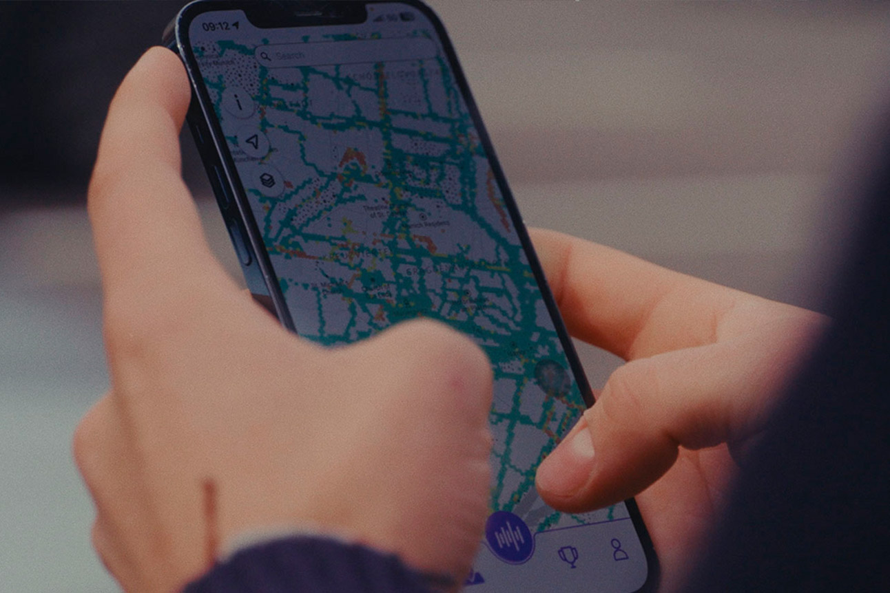 Close-up of a person using the Silencio app on a phone